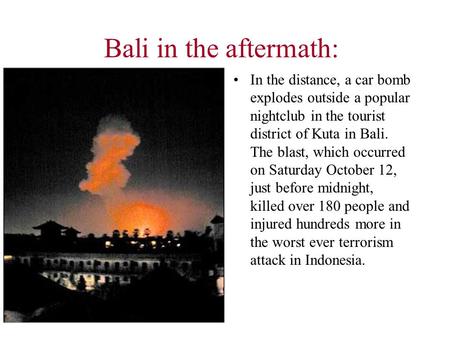 Bali in the aftermath: In the distance, a car bomb explodes outside a popular nightclub in the tourist district of Kuta in Bali. The blast, which occurred.