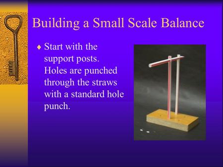 Building a Small Scale Balance  Start with the support posts. Holes are punched through the straws with a standard hole punch.