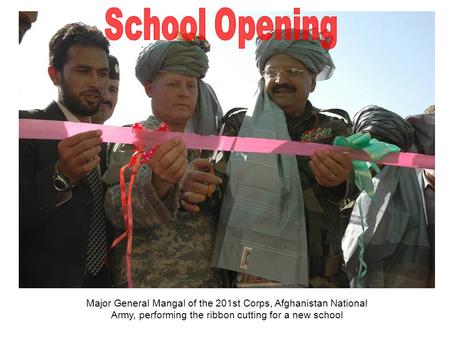 Major General Mangal of the 201st Corps, Afghanistan National Army, performing the ribbon cutting for a new school.