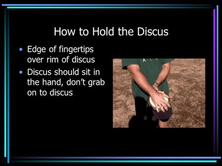 How to Hold the Discus Edge of fingertips over rim of discus
