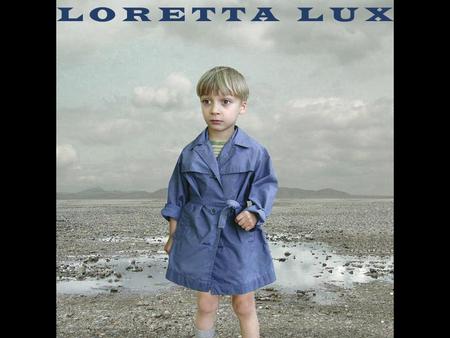 L O R E T T A L U X. She is a contemporary artist, known for her surrealist portraits of children: