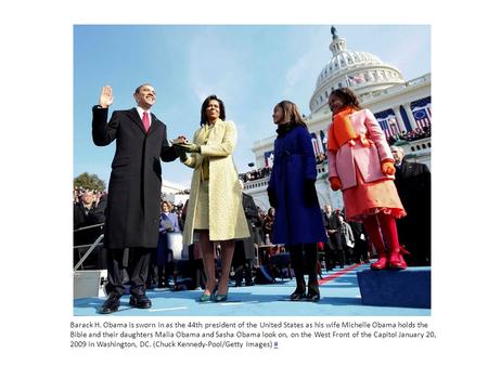 Barack H. Obama is sworn in as the 44th president of the United States as his wife Michelle Obama holds the Bible and their daughters Malia Obama and Sasha.