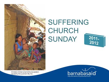 Christian children sit amid the devastation caused by the cyclone in Burma SUFFERING CHURCH SUNDAY.
