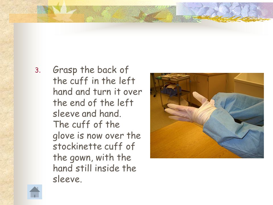Grasp the back of the cuff in the left hand and turn it over the end of the left sleeve and hand.
