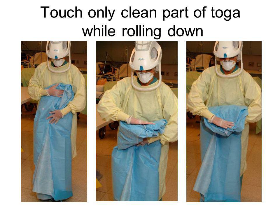 Touch only clean part of toga while rolling down