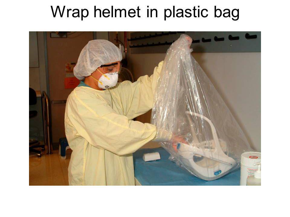 Wrap helmet in plastic bag