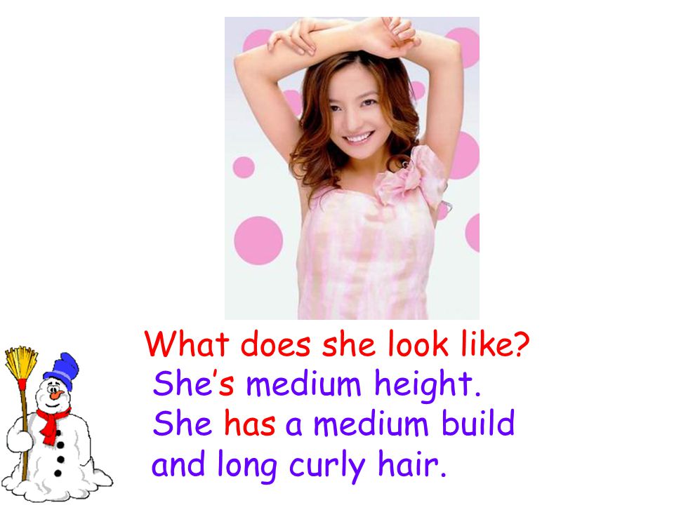 What does she look like She’s medium height. She has a medium build and long curly hair.