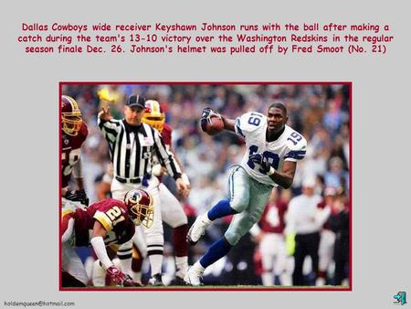 Dallas Cowboys wide receiver Keyshawn Johnson runs with the ball after making a catch during the team's 13-10 victory over the.