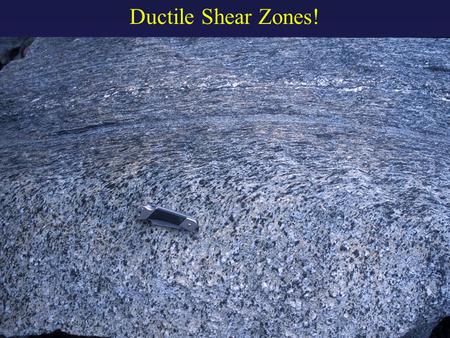 Ductile Shear Zones!. ductile shear zone “zone”: area with higher strain than surrounding rock This is heterogeneous strain. “shear”: simple shear dominates.