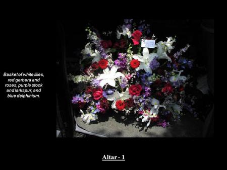 Basket of white lilies, red gerbera and roses, purple stock and larkspur, and blue delphinium. Altar - 1.