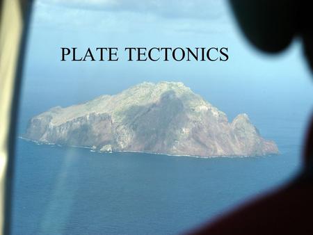 PLATE TECTONICS. The theory is that the earth’s surface is covered by a number of relatively thin plates which move over the material below. Plate Tectonics.