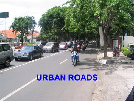 URBAN ROADS. Scope of Urban Roads Urban/Suburban Road Segments  continuous permanent development along all or almost of its length, on at least one side.
