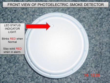 How does a photoelectric smoke detector work? FRONT VIEW OF PHOTOELECTRIC SMOKE DETECTOR LED STATUS INDICATOR LIGHT. Blinks RED when Normal Stay solid.