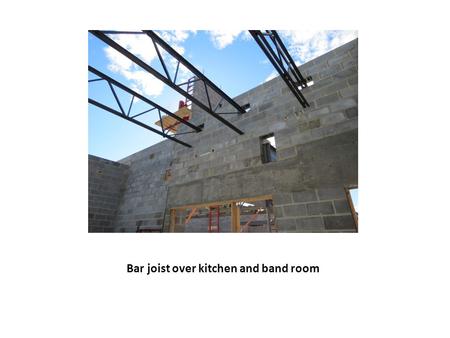 Bar joist over kitchen and band room. Setting bar joist over kitchen and electrical/mechanical rooms.