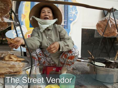 The Street Vendor. “I pray for my health,” says Mai as she scans the crowd looking for potential customers walking along the street. “I work every day.