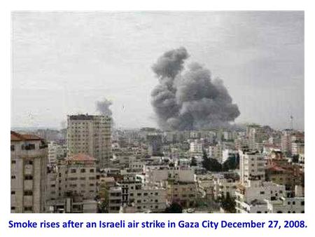 Smoke rises after an Israeli air strike in Gaza City December 27, 2008.