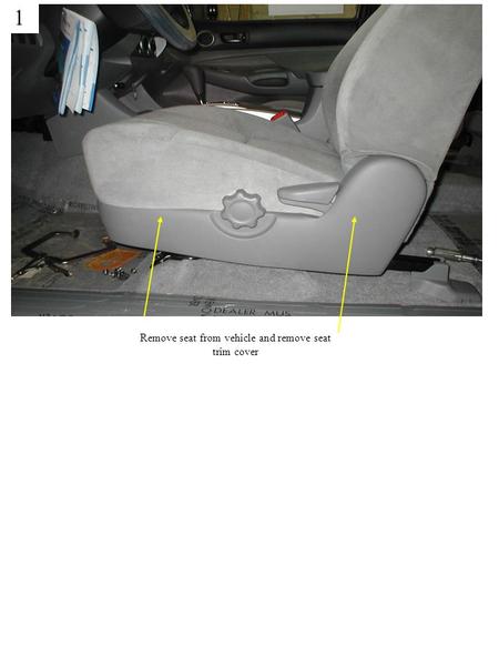 1 Remove seat from vehicle and remove seat trim cover.
