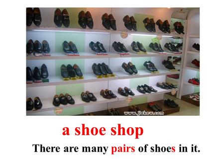 A shoe shop There are many pairs of shoes in it..
