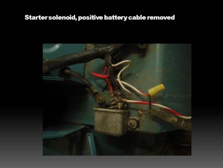 Starter solenoid, positive battery cable removed.