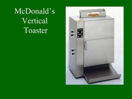 McDonald’s Vertical Toaster. View inside cabinet Relays Drive Train Motor with fan in place. Plate heater.