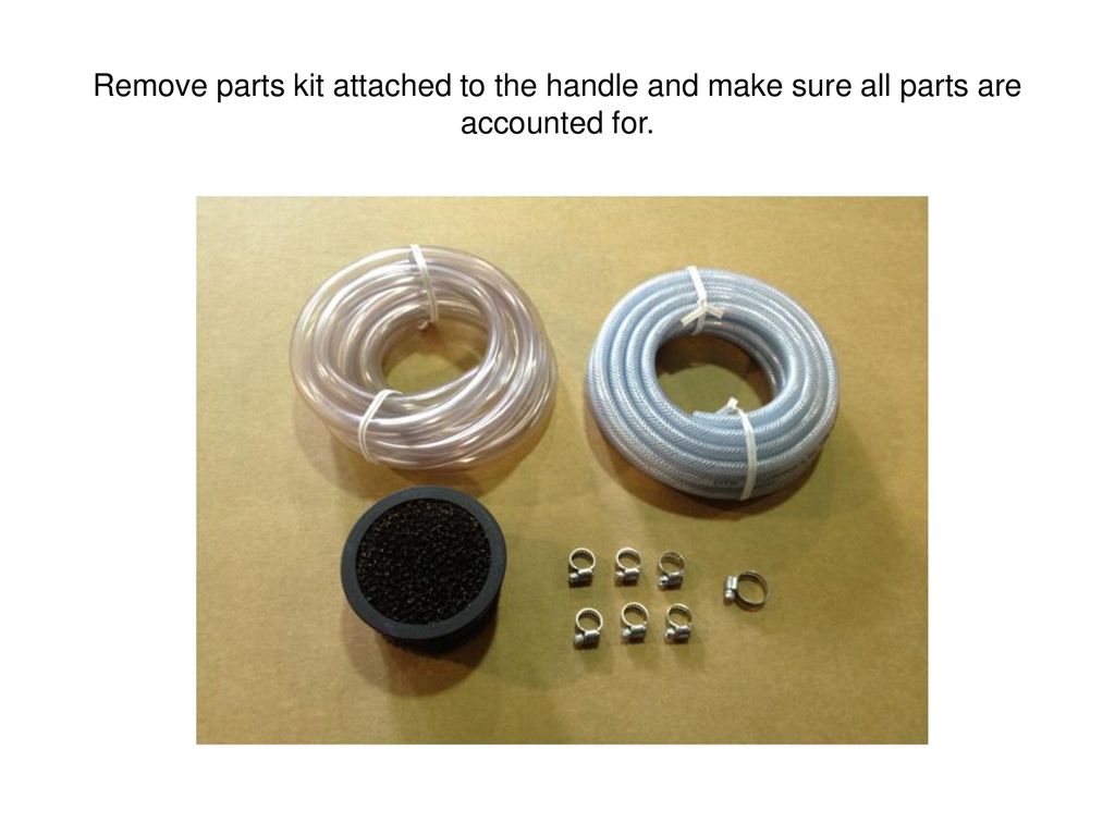 Remove parts kit attached to the handle and make sure all parts are accounted for.
