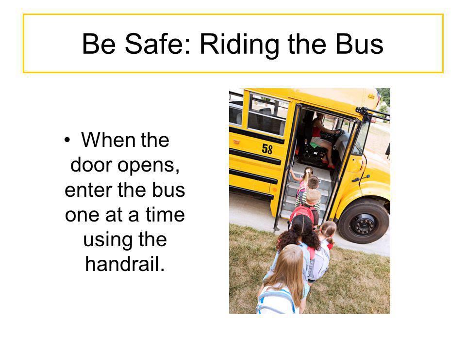 When the door opens, enter the bus one at a time using the handrail.