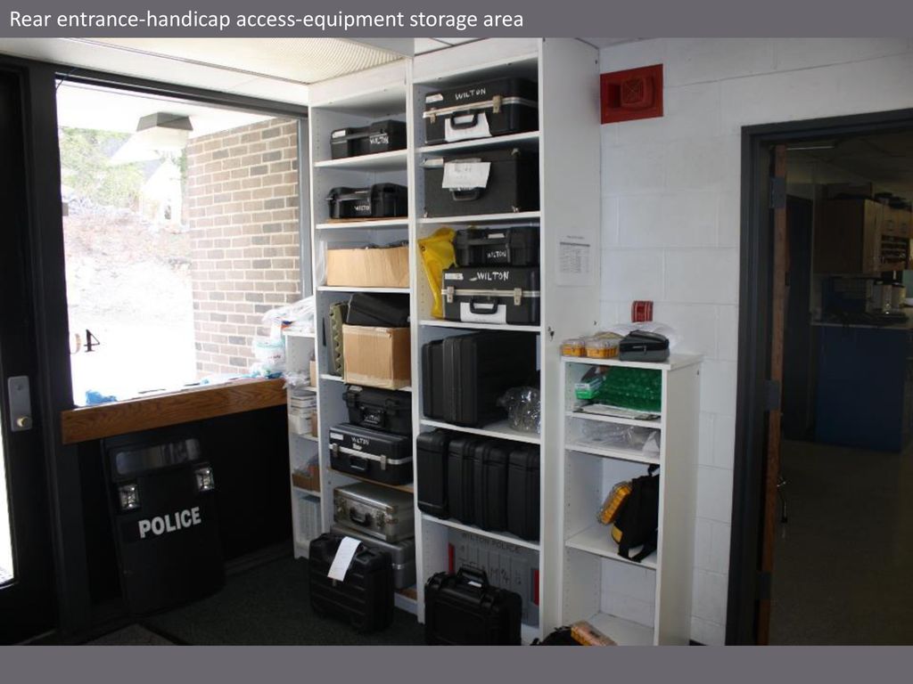 Rear entrance-handicap access-equipment storage area