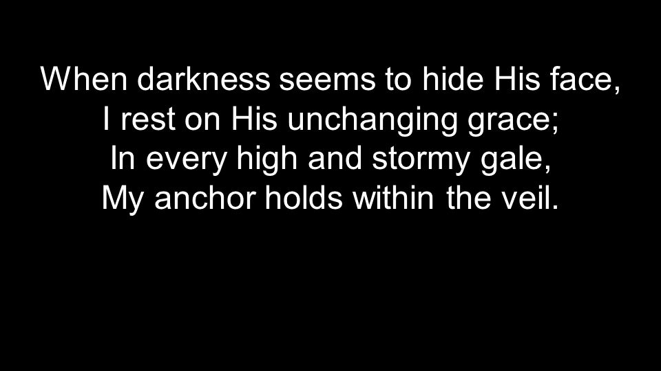When darkness seems to hide His face, I rest on His unchanging grace;