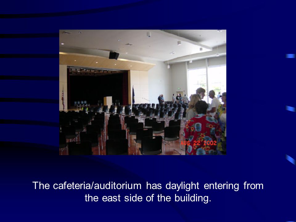 The cafeteria/auditorium has daylight entering from the east side of the building.