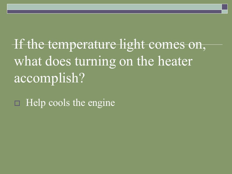 If the temperature light comes on, what does turning on the heater accomplish