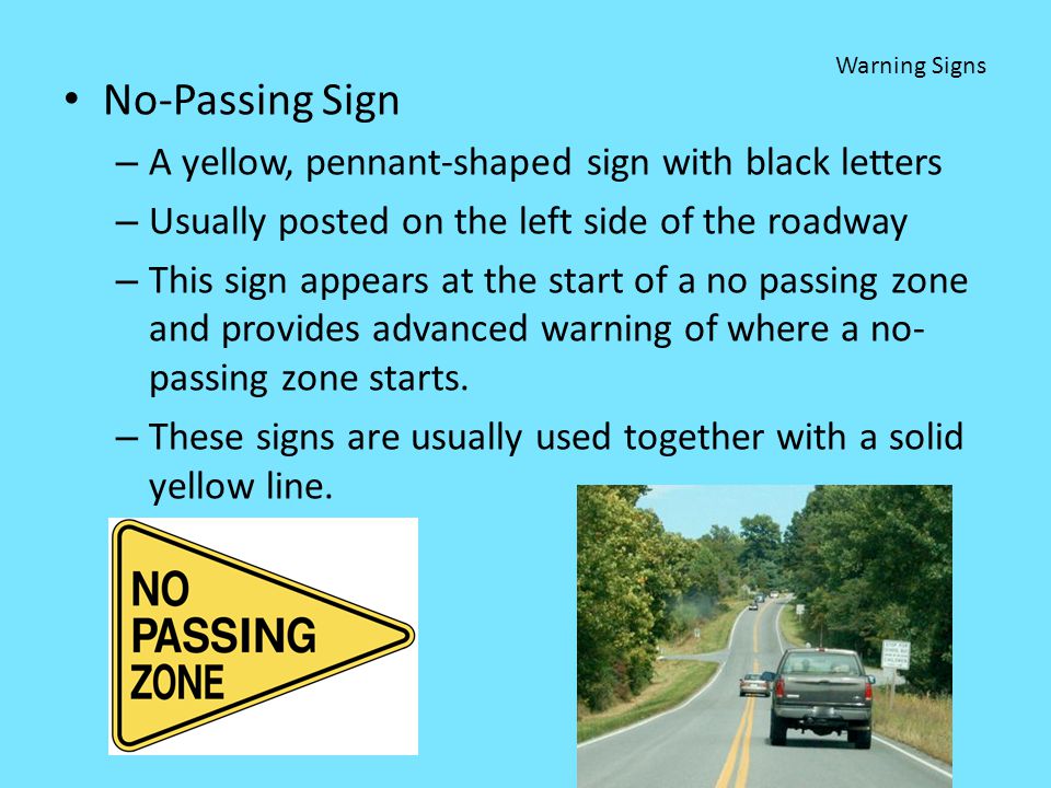 No-Passing Sign A yellow, pennant-shaped sign with black letters