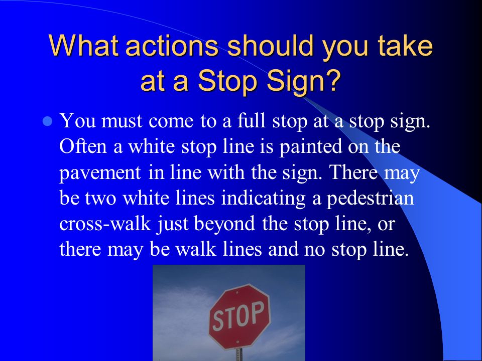 What actions should you take at a Stop Sign