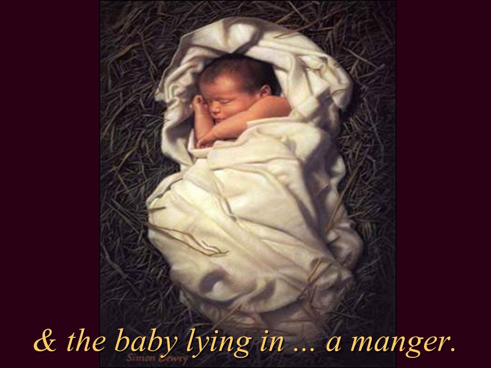 & the baby lying in ... a manger.
