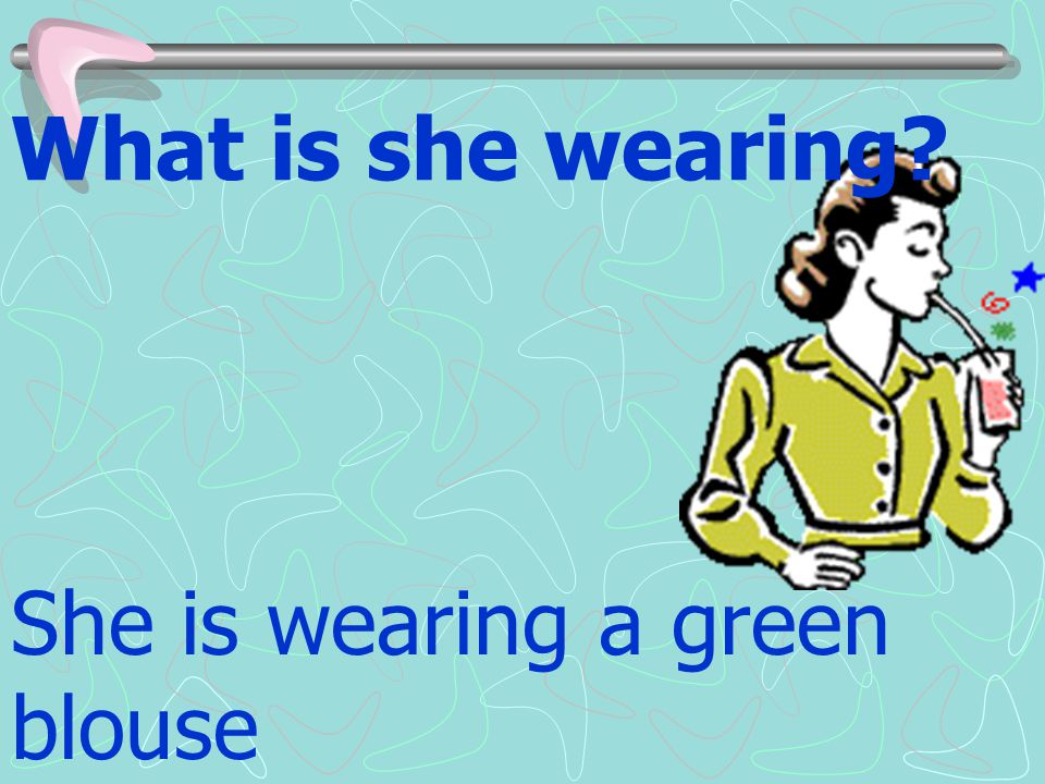 What is she wearing She is wearing a green blouse