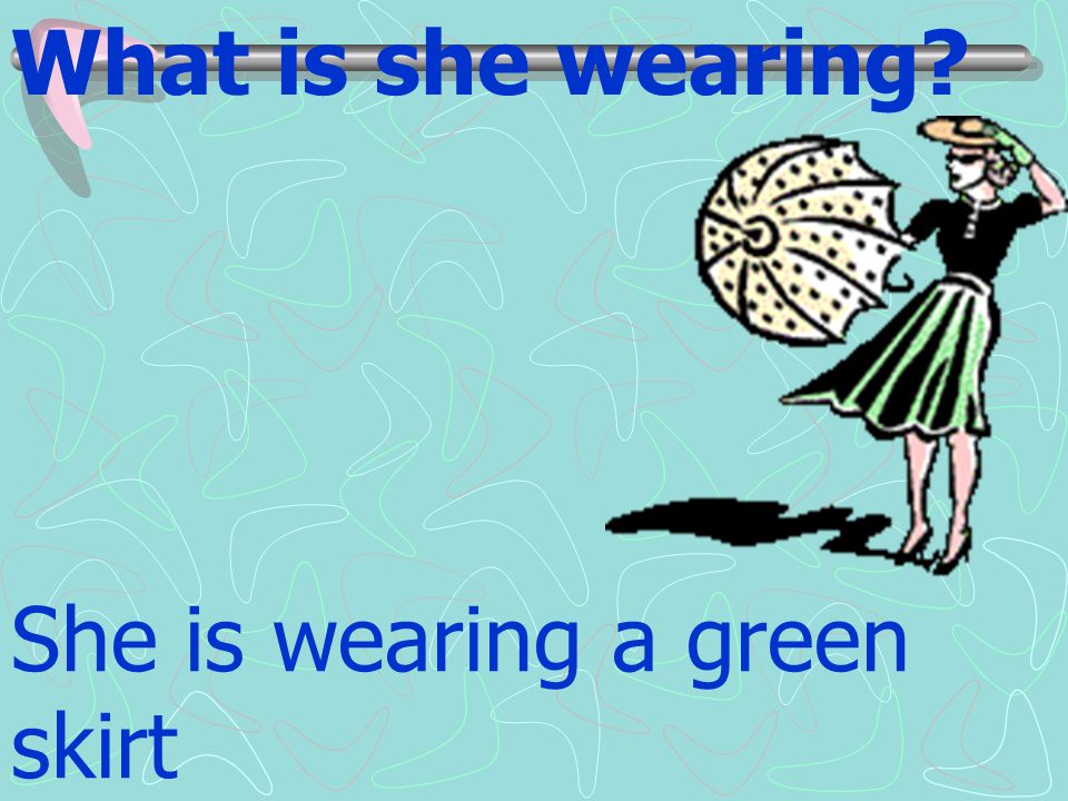 What is she wearing She is wearing a green skirt