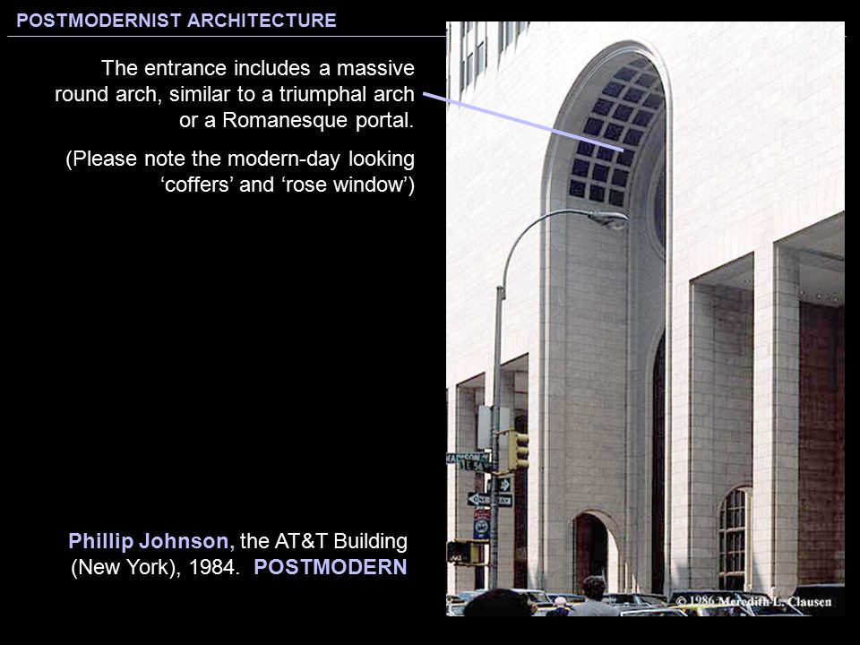 The entrance includes a massive round arch, similar to a triumphal arch or a Romanesque portal.