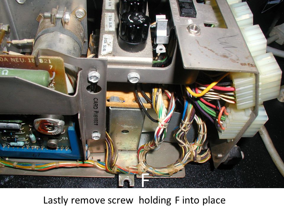 F Lastly remove screw holding F into place
