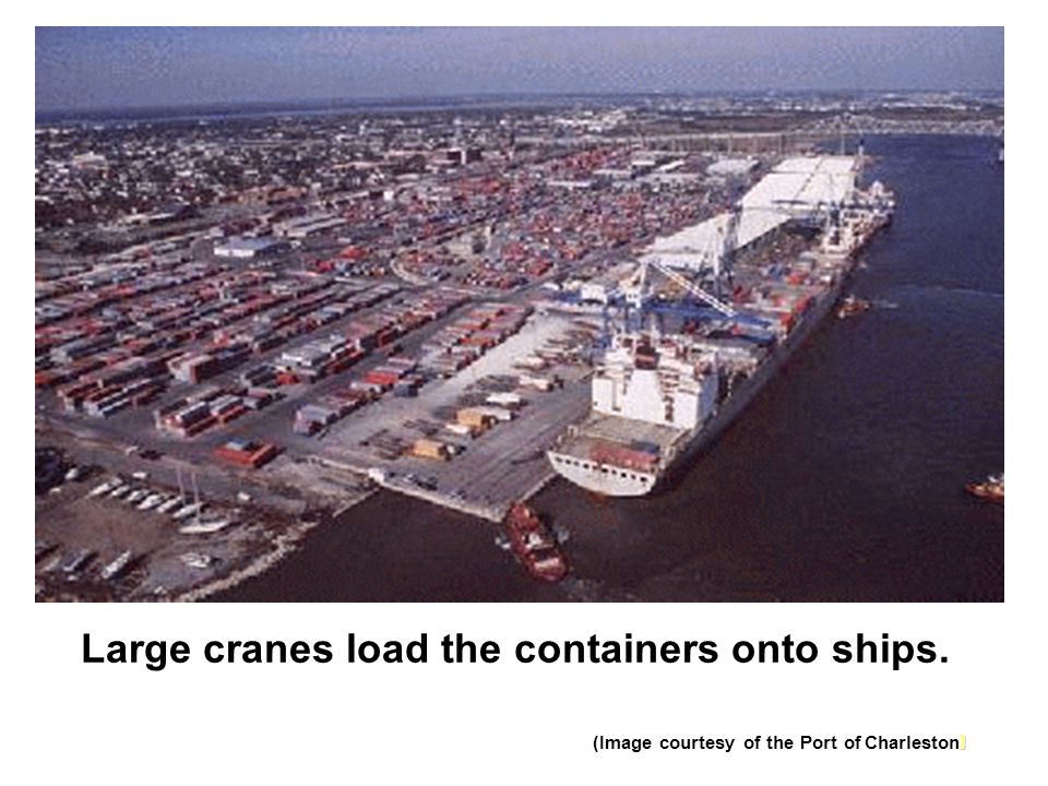 Large cranes load the containers onto ships.