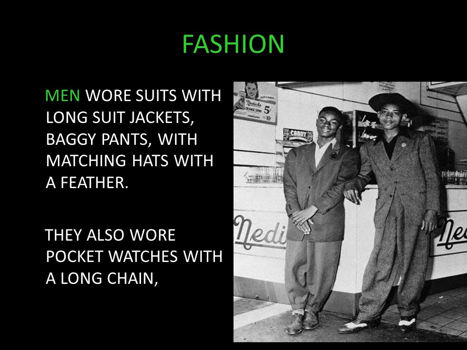 FASHION MEN WORE SUITS WITH LONG SUIT JACKETS, BAGGY PANTS, WITH MATCHING HATS WITH A FEATHER.