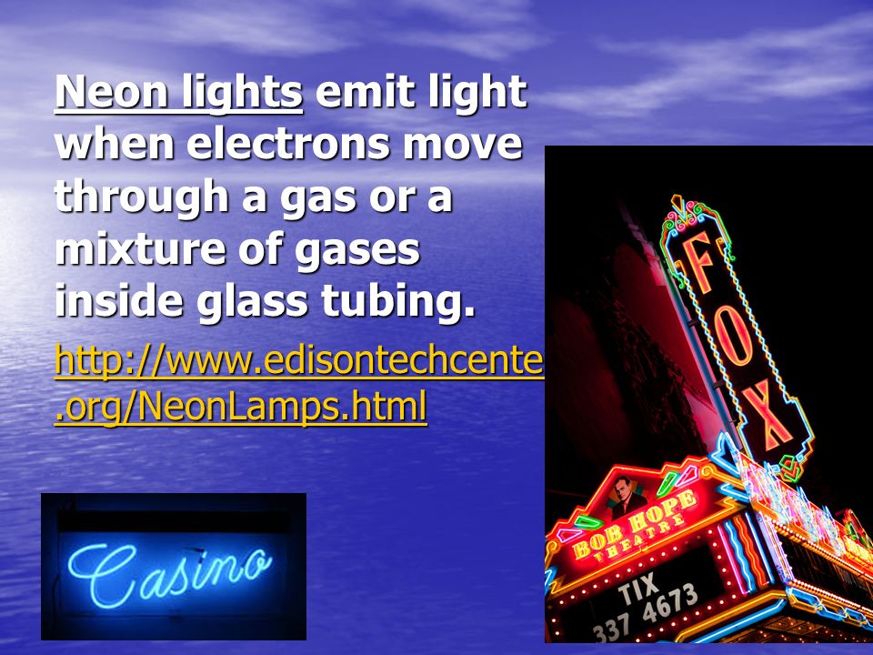 Neon lights emit light when electrons move through a gas or a mixture of gases inside glass tubing.