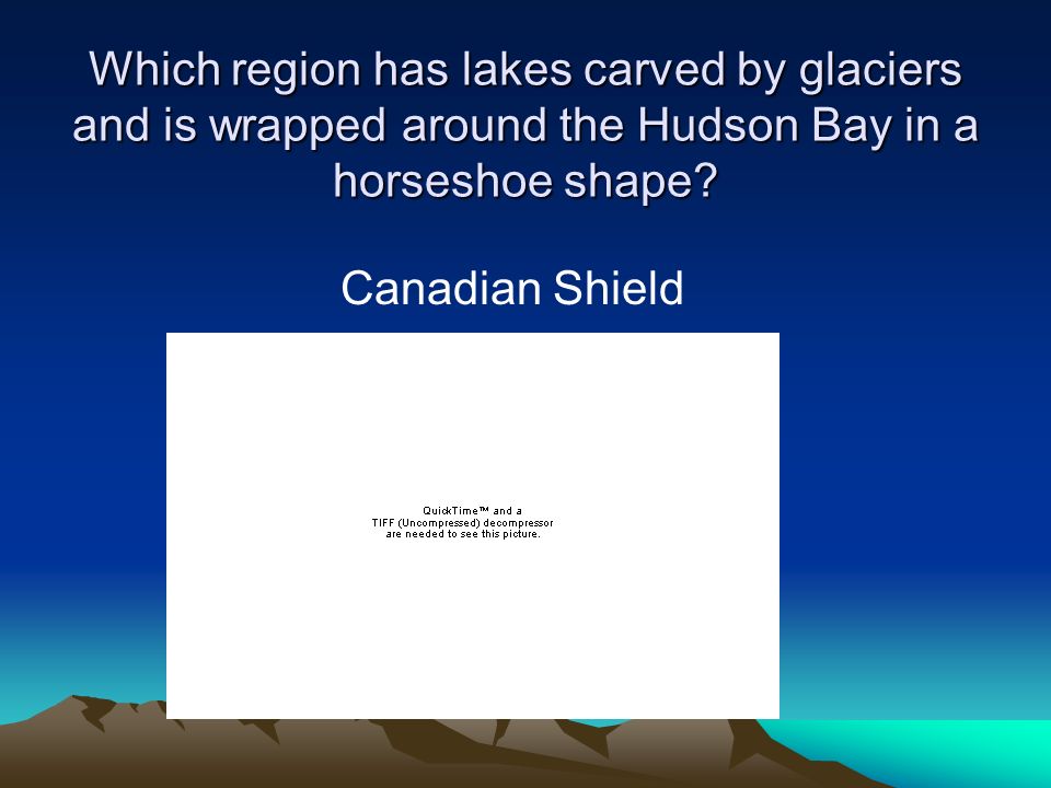 Which region has lakes carved by glaciers and is wrapped around the Hudson Bay in a horseshoe shape