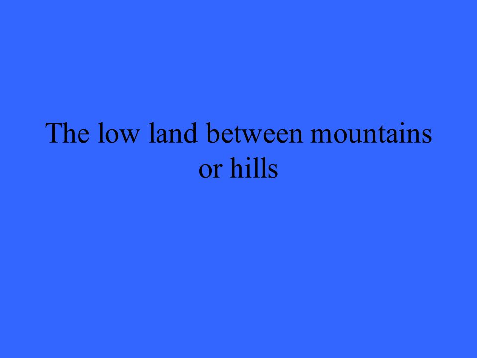 The low land between mountains or hills