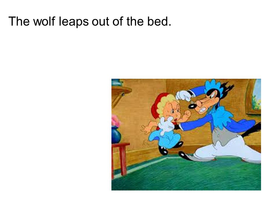 The wolf leaps out of the bed.